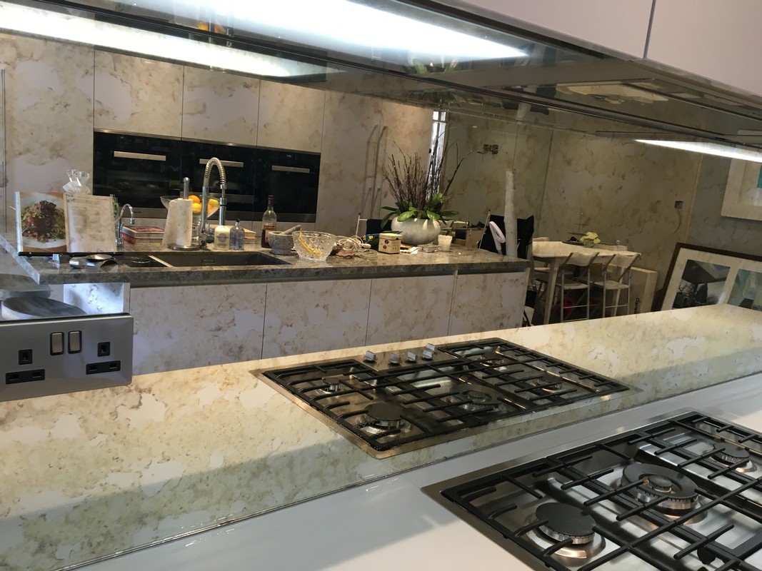 Mirror glass splashback in Berkhamsted luxury kitchen