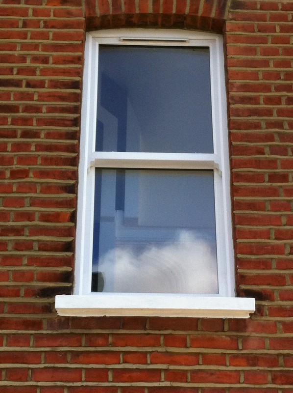 uPVC sash window on Victorian red brick house in Berkhamsted
